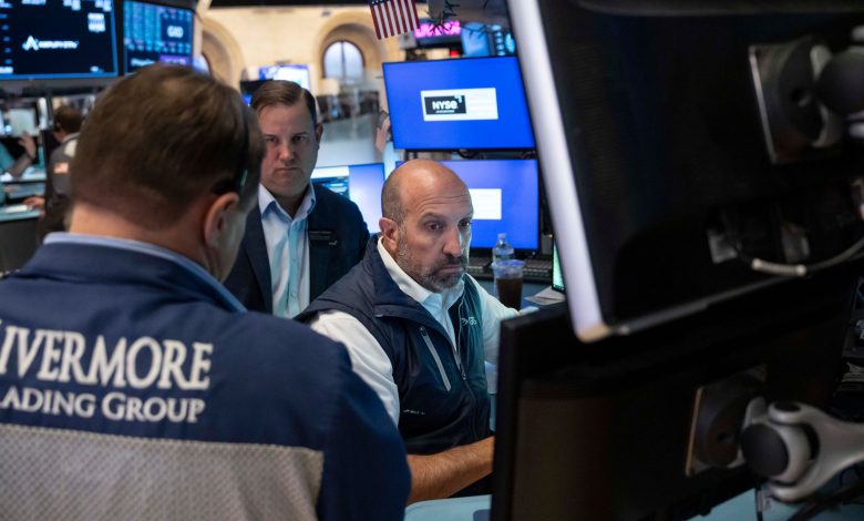 Stocks fall after a surprisingly strong jobs report raises prospects of an interest rate hike Stocks fall after a surprisingly strong jobs report raises prospects of an interest rate hike