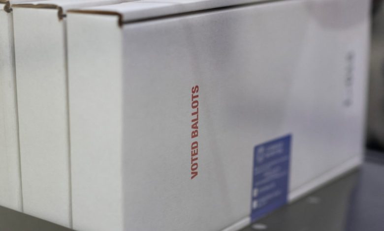 Federal judge extends block on Trump order seeking to limit mail voting in the midterms