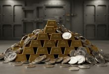 Gold steady, silver gains over 1% as oil prices ease